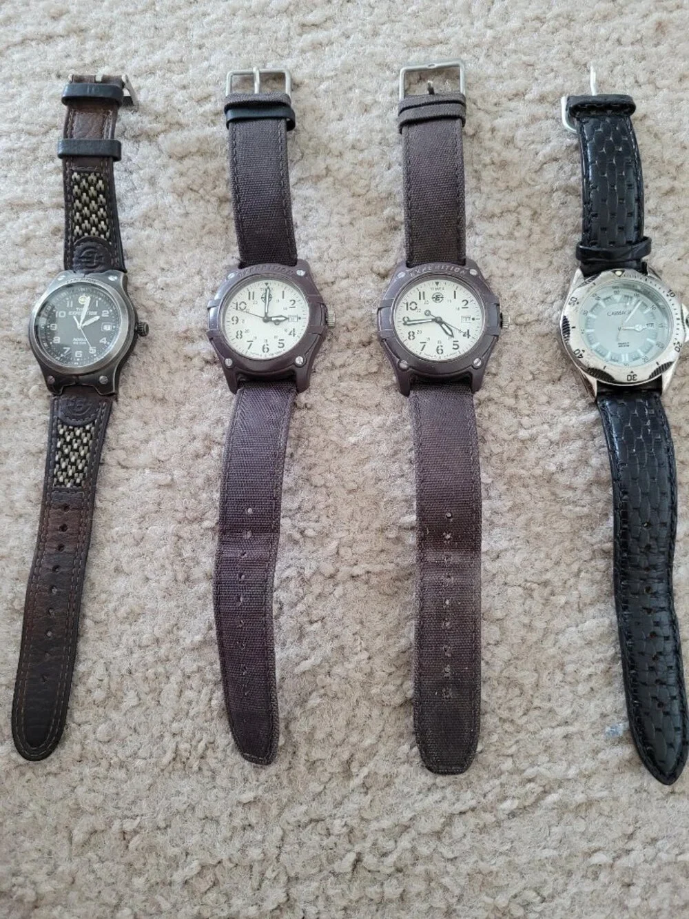 Four men's Timex watches with Indiglo in good condition